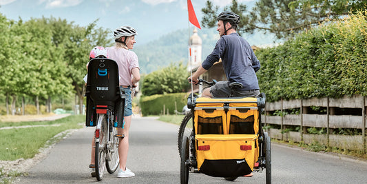 Guide complet pour transporter son enfant à vélo : remorques, sièges avant et sièges arrière